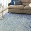8' x 10' Ivory & Blue Abstract Power Loom Area Rug