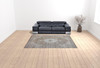 8' x 11' Beige Oriental Power Loom Distressed Stain Resistant Area Rug