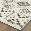 8' x 11' Ivory and Brown Geometric Shag Power Loom Stain Resistant Area Rug