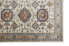 8' x 11' Ivory Orange and Blue Floral Stain Resistant Area Rug