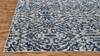 9' Blue Ivory and Black Round Floral Distressed Stain Resistant Area Rug