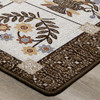 8' x 11' Inspired Quilt Brown Rectangle Nylon Area Rug