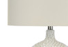 28" White and Silver Ceramic Round Table Lamp with Cream Drum Shade