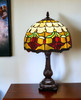 19" Dark Brown Metal Candlestick Table Lamp with Orange Dome Shade