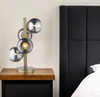 24" Brass Metal Four Light Novelty Table Lamp with Silver Metallic Globe Shades