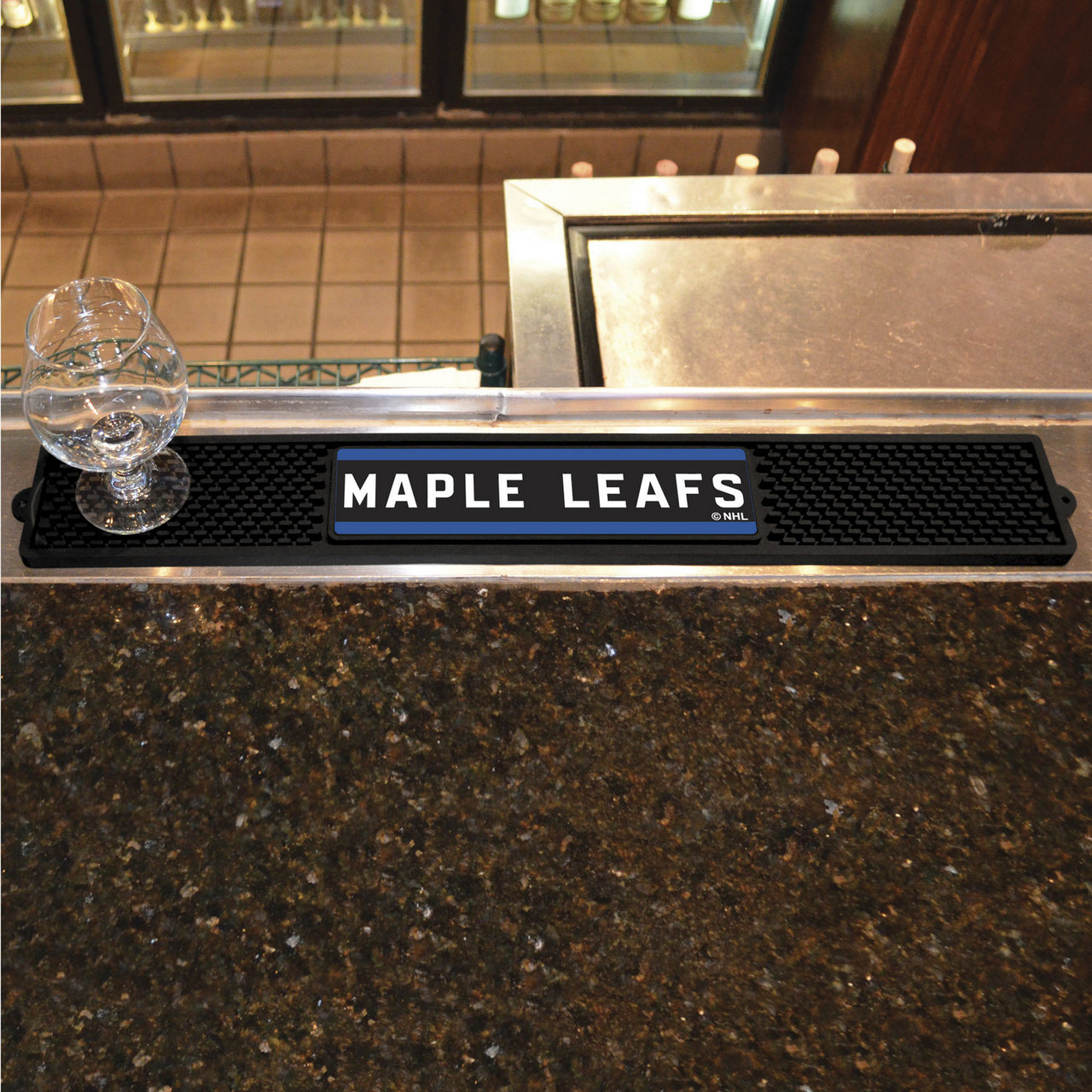 https://cdn11.bigcommerce.com/s-oo0gdojvjo/images/stencil/1280x1280/products/60422/83779/16993-toronto-maple-leafs-vinyl-drink-mat-nhl-fanmats__32162.1625572082.jpg?c=2