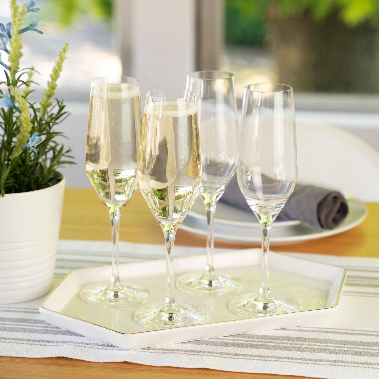 https://cdn11.bigcommerce.com/s-oo0gdojvjo/images/stencil/1280x1280/products/68540/101163/spiegelau-style-8-5-oz-champagne-flutes-set-of-4-2__28719.1683795489.jpg?c=2&imbypass=on
