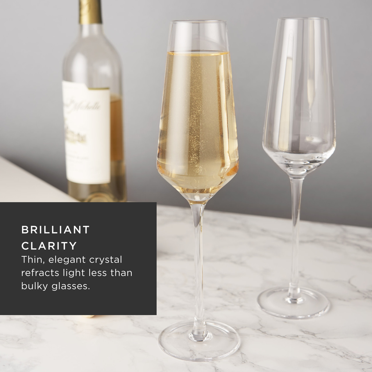 https://cdn11.bigcommerce.com/s-oo0gdojvjo/images/stencil/1280x1280/products/68543/101628/angled-crystal-champagne-flutes-by-viski-set-of-2-3__17372.1683797265.jpg?c=2&imbypass=on