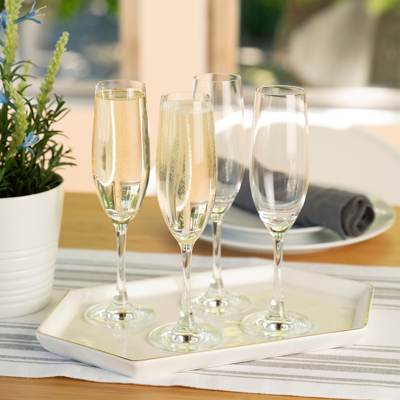 https://cdn11.bigcommerce.com/s-oo0gdojvjo/images/stencil/1280x1280/products/68552/101175/spiegelau-wine-lovers-6-7-oz-champagne-flutes-set-of-4-2__80085.1683795491.jpg?c=2&imbypass=on