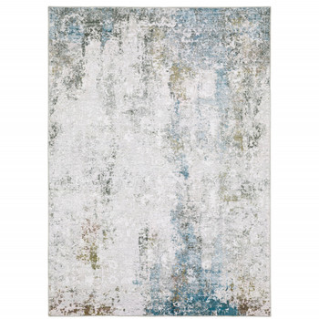 2' x 3' Ivory and Blue Abstract Printed Stain Resistant Non Skid Area Rug