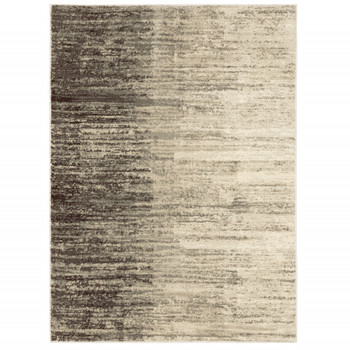 5' x 7' Beige and Grey Abstract Power Loom Stain Resistant Area Rug