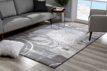 5' x 7' Gray Abstract Power Loom Polyester Area Rug