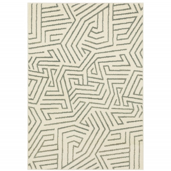 5' x 7' Beige Grey and Light Blue Geometric Power Loom Stain Resistant Area Rug