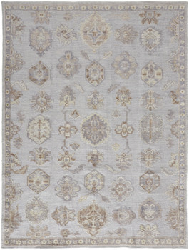 5' x 8' Ivory Silver and Tan Floral Hand Knotted Stain Resistant Area Rug