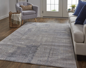 5' x 8' Taupe Tan and Blue Abstract Power Loom Distressed Stain Resistant Area Rug