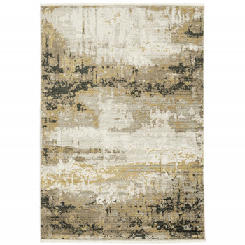 5' x 8' Grey Gold Black Charcoal and Beige Abstract Power Loom Area Rug with Fringe