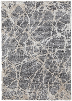 5' x 8' Gray and Ivory Abstract Power Loom Stain Resistant Area Rug