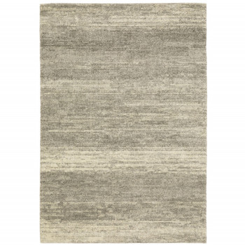 5' x 8' Grey Beige and Tan Abstract Power Loom Stain Resistant Area Rug