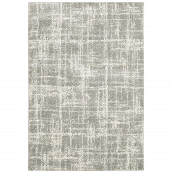 6' x 9' Grey and Ivory Abstract Shag Power Loom Stain Resistant Area Rug