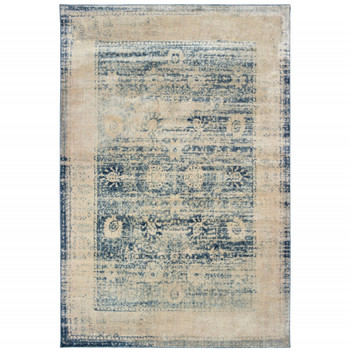 6' x 9' Ivory and Blue Oriental Power Loom Stain Resistant Polypropylene Area Rug