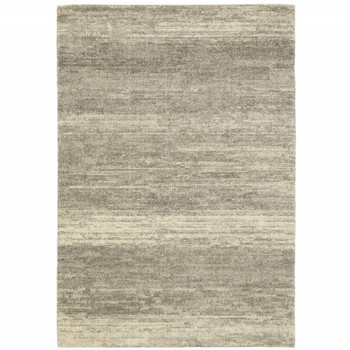 6' x 9' Grey Beige and Tan Abstract Power Loom Stain Resistant Area Rug