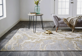 7' x 10' Ivory Silver and Gold Abstract Stain Resistant Area Rug
