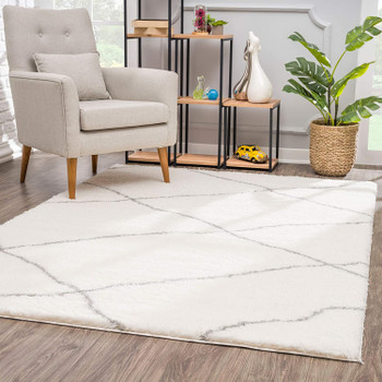 7' x 9' Ivory Modern Uneven Lattice Area Rug