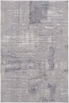 7' x 9' Taupe Tan and Blue Abstract Power Loom Distressed Stain Resistant Area Rug