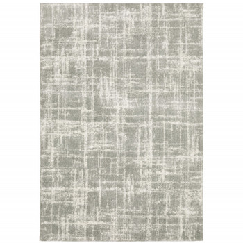 8' x 11' Grey and Ivory Abstract Shag Power Loom Stain Resistant Area Rug