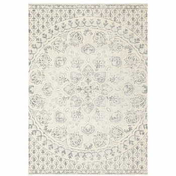 8' x 11' Ivory and Grey Floral Power Loom Stain Resistant Area Rug