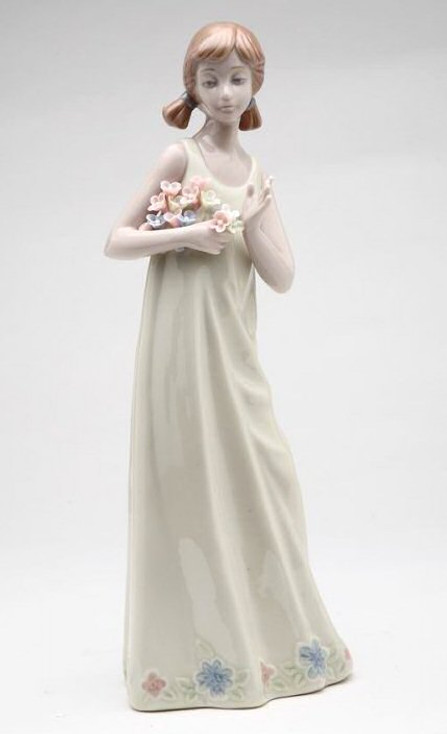 Girl Holding Flowers Porcelain Sculpture by Nadal