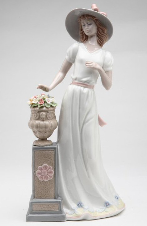 Lady Standing by Flower Pedestal Porcelain Sculpture by Nadal