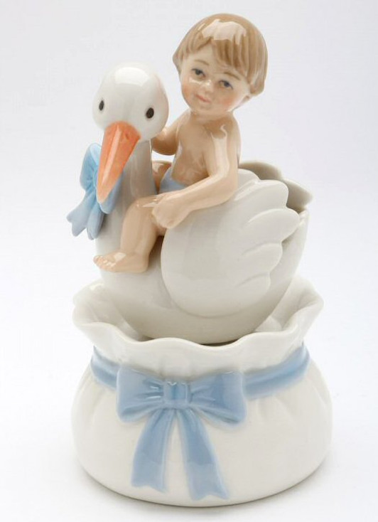 Baby Boy Sitting on a Stork Porcelain Musical Music Box Sculpture