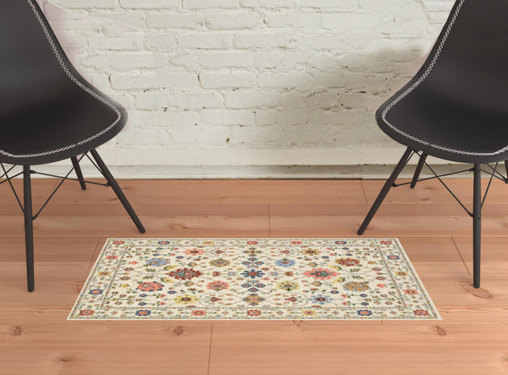 2' x 3' Ivory Oriental Power Loom Stain Resistant Area Rug with Fringe