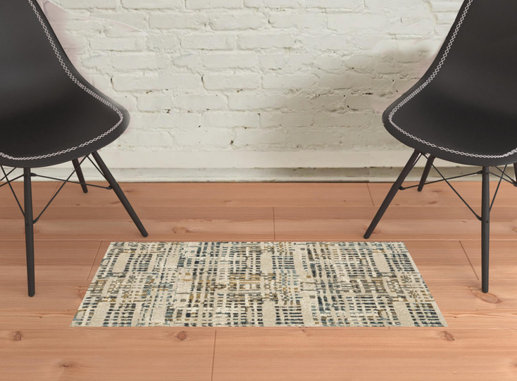 2' x 3' Beige Grey Blues Orange Yellow and Ivory Abstract Power Loom Area Rug