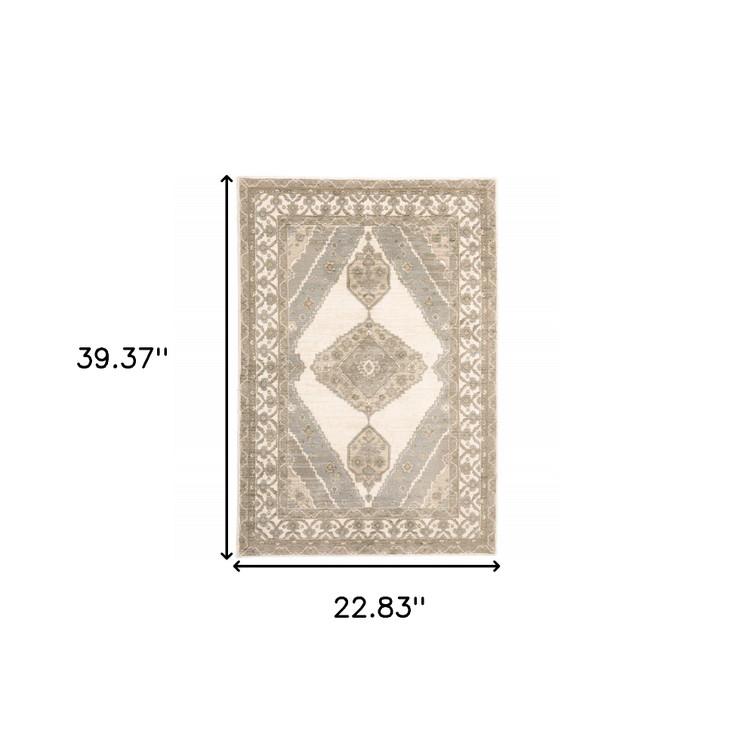 2' x 3' Beige and Ivory Oriental Power Loom Stain Resistant Area Rug