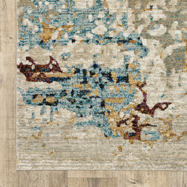 2' x 3' Beige and Blue Abstract Power Loom Stain Resistant Area Rug