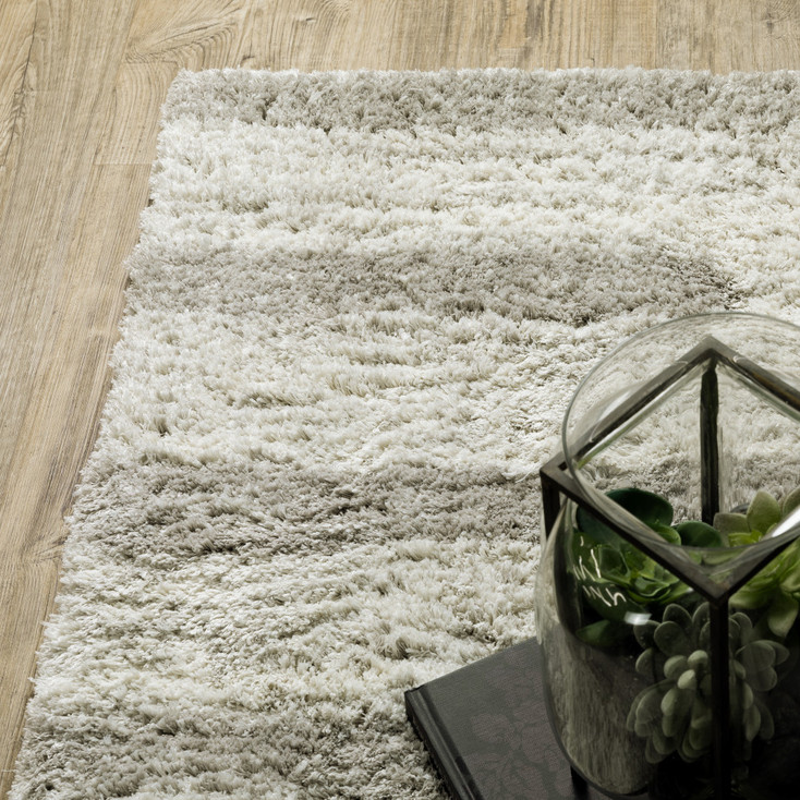 2' x 3' Ivory and Grey Geometric Shag Power Loom Stain Resistant Area Rug