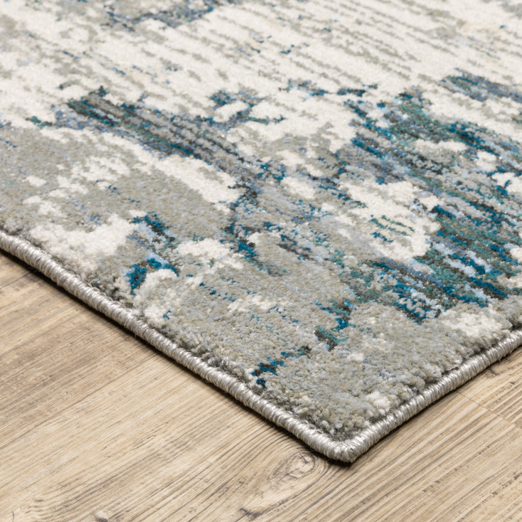 2' x 3' Blue Beige and Teal Abstract Power Loom Stain Resistant Area Rug