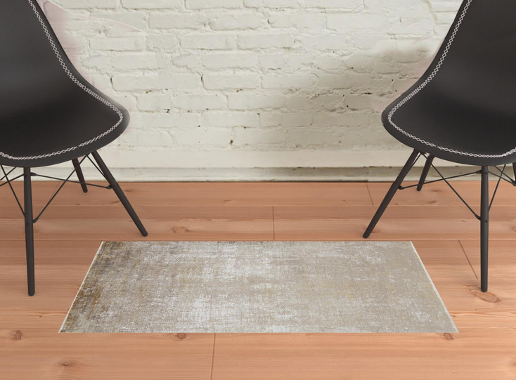 2' x 3' Taupe Ivory and Gold Abstract Area Rug with Fringe