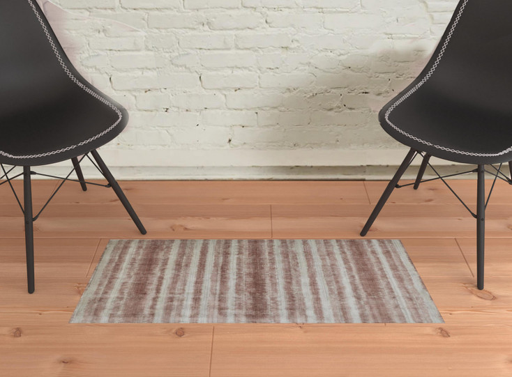 2' x 3' Tan Ivory and Pink Abstract Hand Woven Area Rug