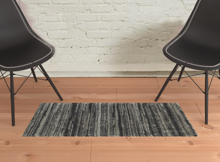 2' x 3' Charcoal Silver and Grey Geometric Shag Power Loom Stain Resistant Area Rug