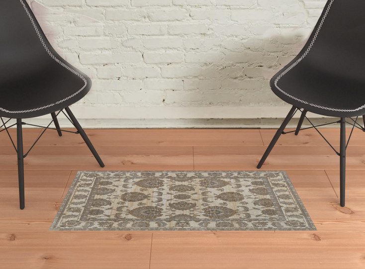 2' x 3' Tan Ivory and Brown Power Loom Area Rug