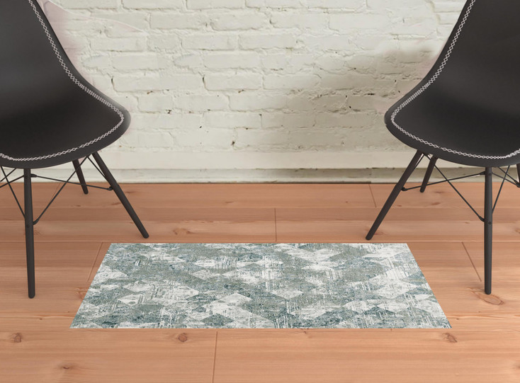 2' x 3' Green and Ivory Patchwork Distressed Stain Resistant Area Rug