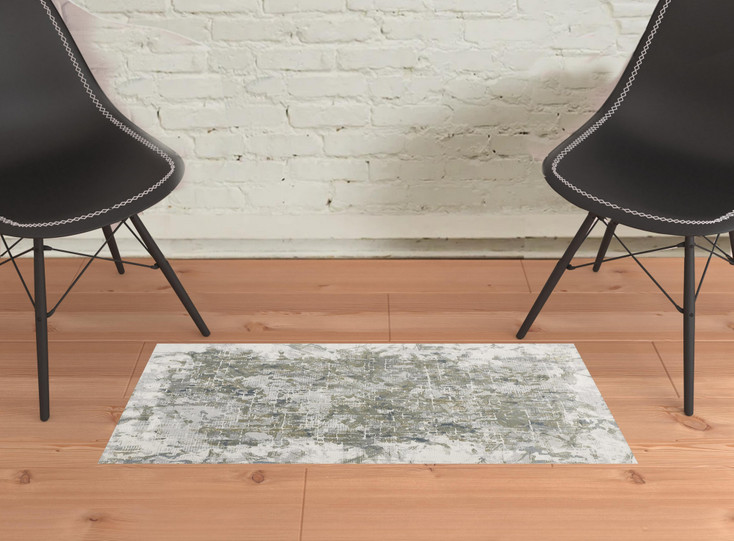 2' x 3' Green Gray and Ivory Abstract Distressed Stain Resistant Area Rug