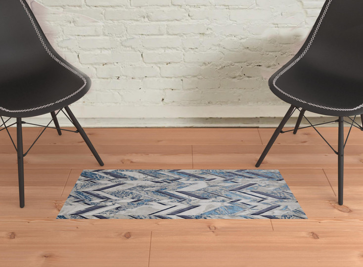 2' x 3' Ivory Blue and Gray Chevron Power Loom Distressed Area Rug