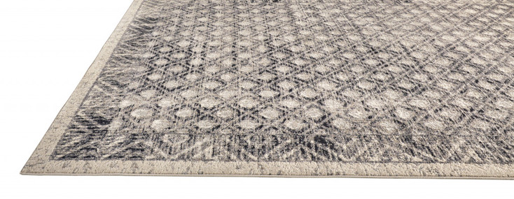 2' x 3' Ivory Black and Taupe Abstract Stain Resistant Area Rug