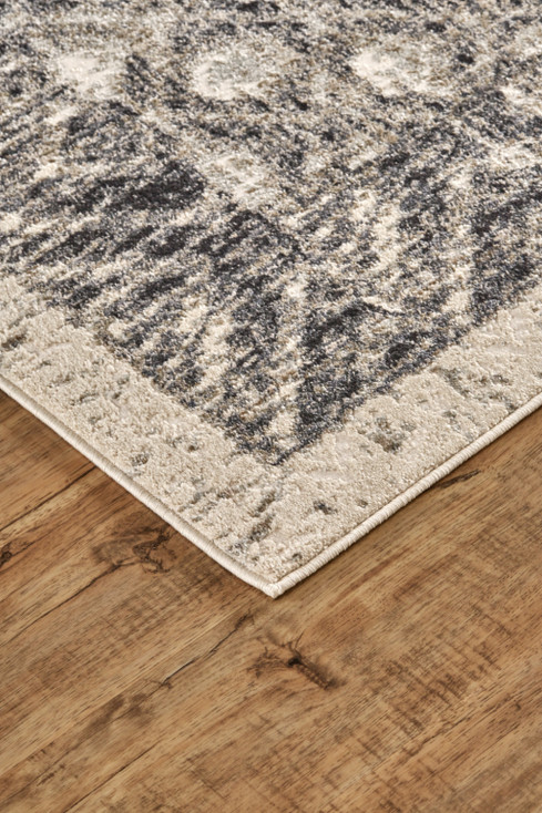 2' x 3' Ivory Black and Taupe Abstract Stain Resistant Area Rug