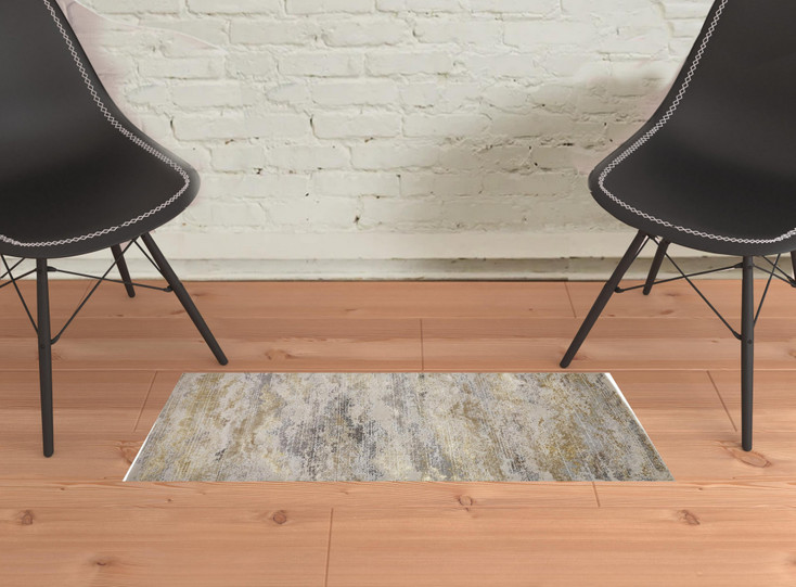 2' x 3' Gold Gray and Ivory Abstract Stain Resistant Area Rug