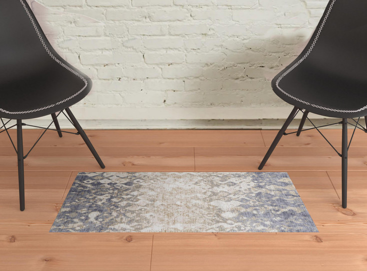 2' x 3' Tan Ivory and Blue Abstract Power Loom Distressed Area Rug